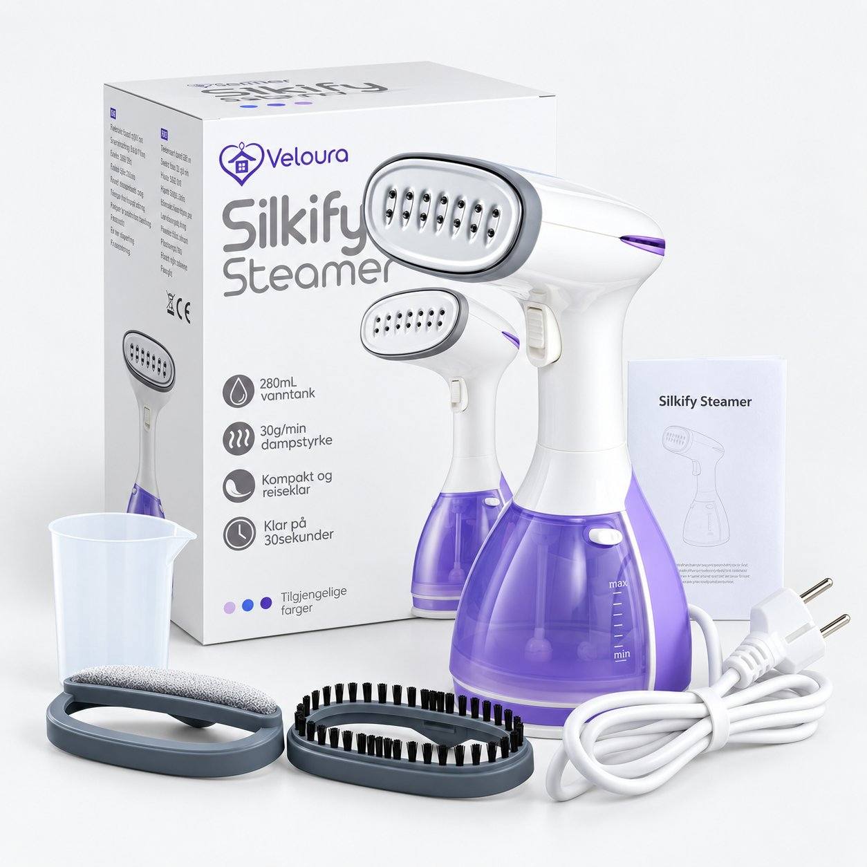 Lila Silkify steamer med tillbehör, måttkopp, bruksanvisning och förpackning